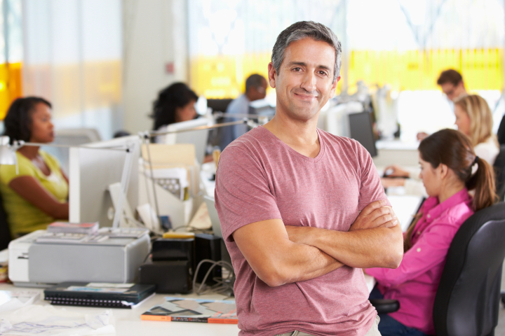 Expressing Gratitude Through a Clean Workspace: happy workers in a clean office, one facing front with a smile