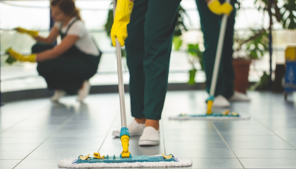 Cleaning crew cleaning common waiting area - Company Vision