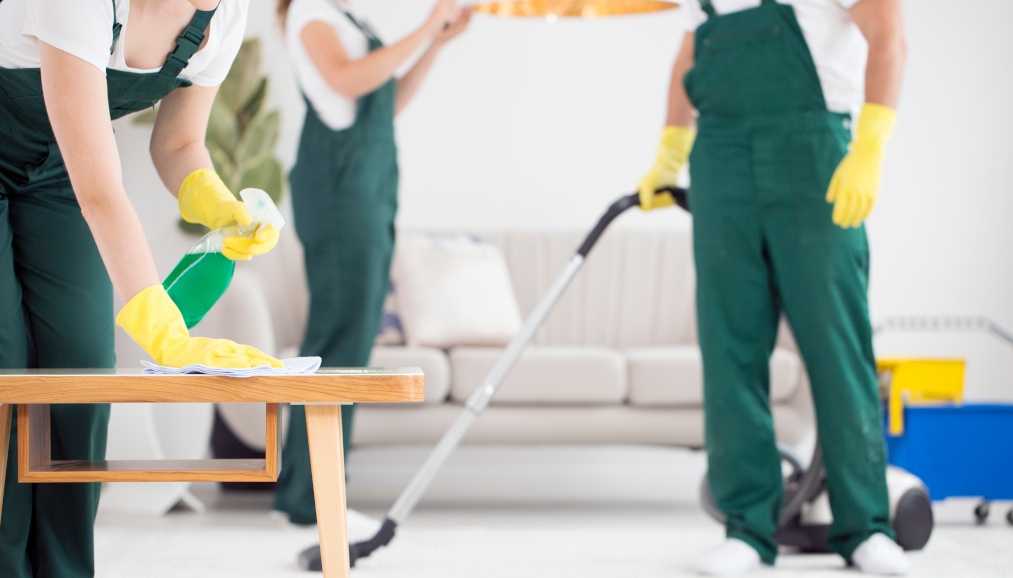 Cleaning crew cleaning living room